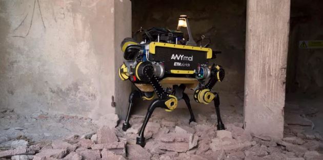 Scientists teach a robot dog to get back up after they kick it down